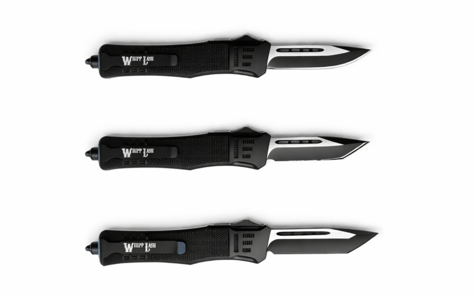 Three black and silver OTF knives on a white background. Each has a different blade design.